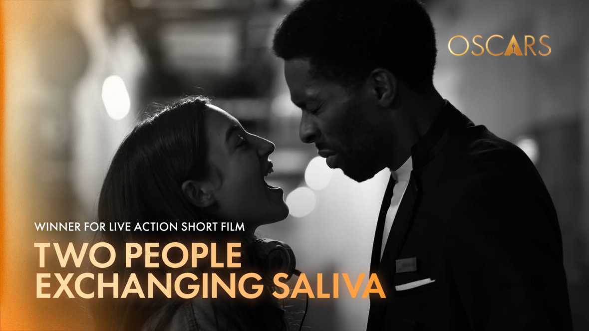 Two People Exchanging Saliva (